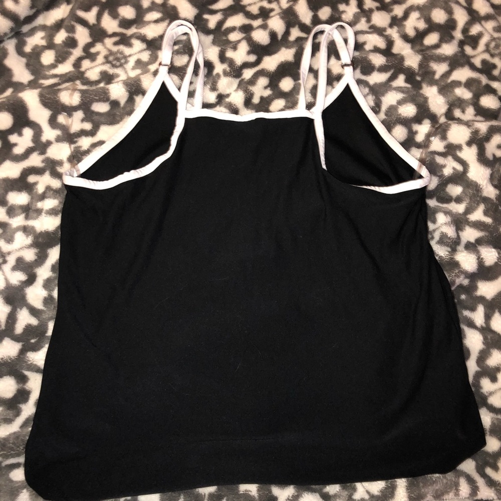 This is a large Black and white tank top